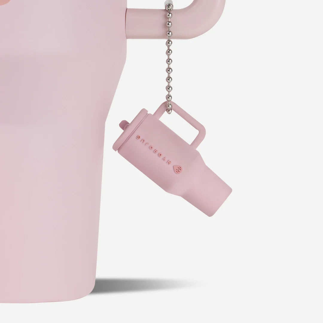 traveler-keychain-r0 Web-TravelerKeychainPhotos-PinkSand2.webp